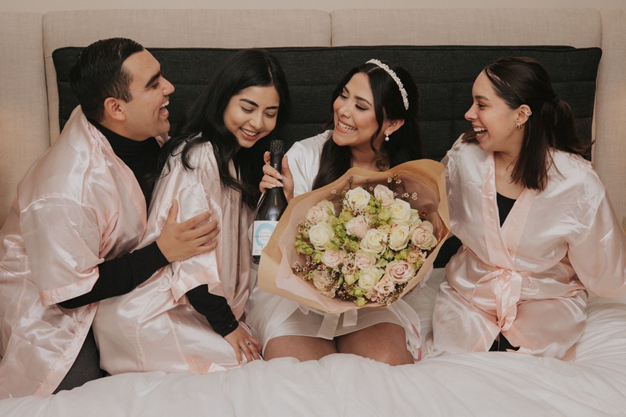 A happy wedding party after finding the best way to get married in Denmark